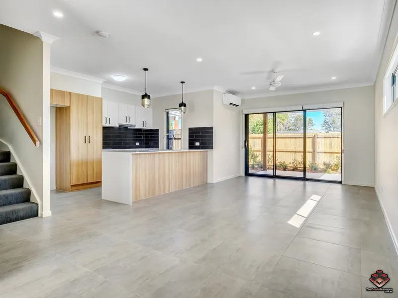 Stunning Four Bedroom Townhouse with Single Lock-Up Garage and Carport