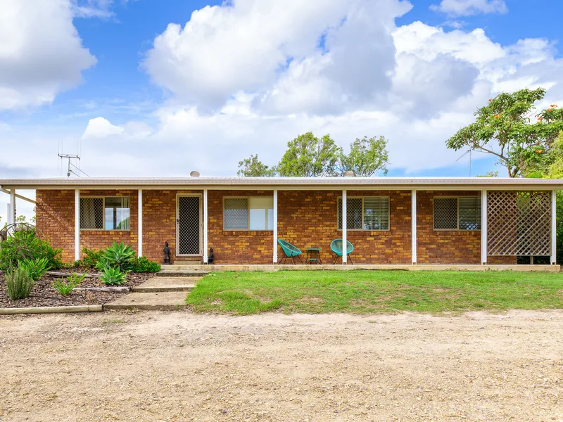 Sought-after Acreage With Oversized Shed!