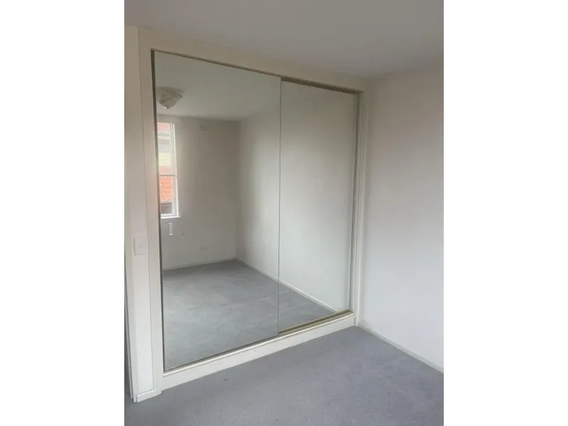 Large Freshly Painted and Newly Carpeted Apartment