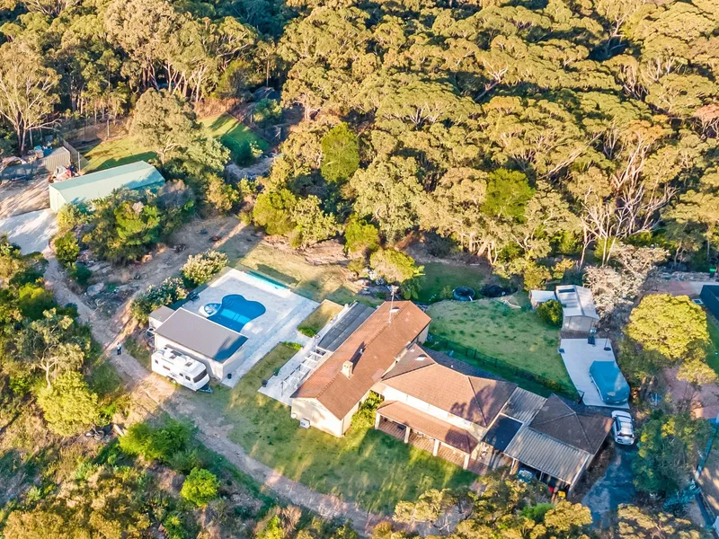 Relaxed Acreage Lifestyle - Renovate or Rebuild!