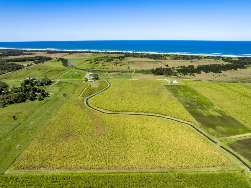 Rare Pristine Coastal Living with Acreage Awaits!