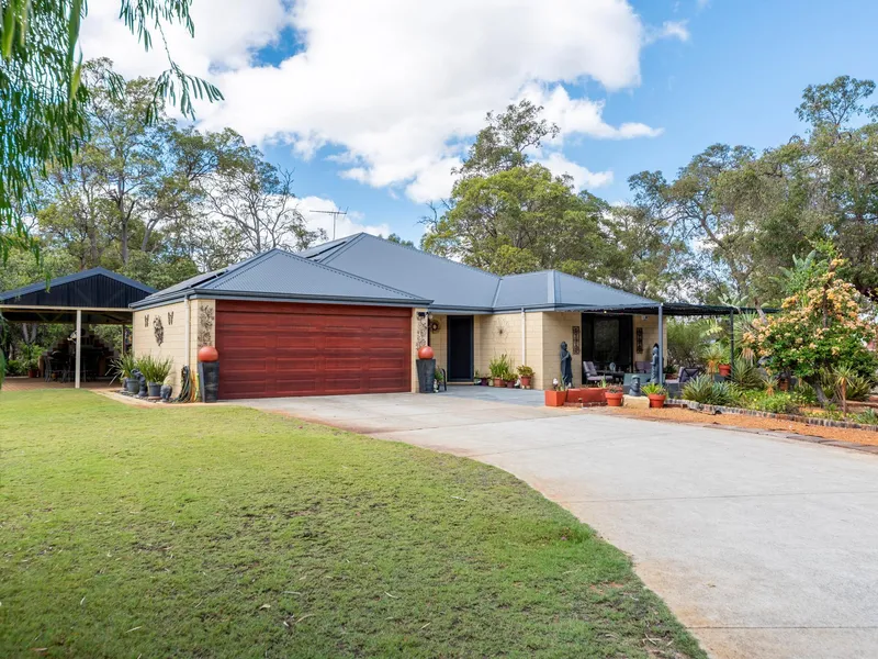 A beautiful home in approximately 5 acres of bushland setting! Your very own rural retreat