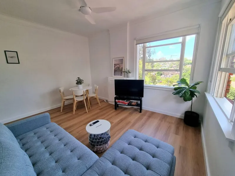 Recently renovated and fully furnished bright top floor apartment