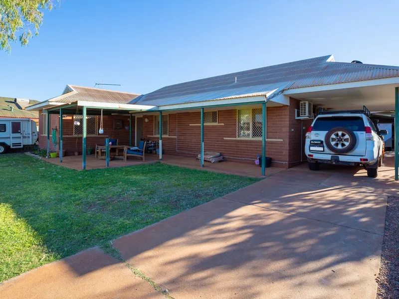 ROCK-SOLID BRICK HOME WITH BIG SHED