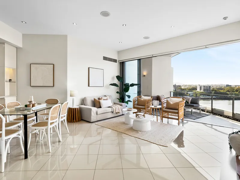 Top level apartment offering riverfront views!