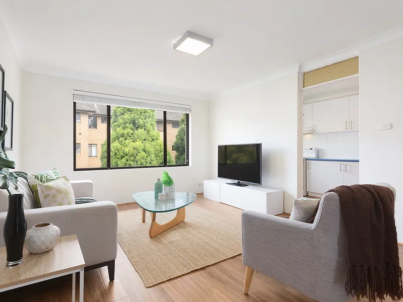 Top floor brick apartment in convenient location
