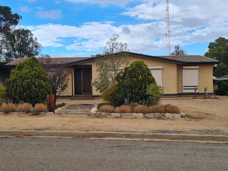 Neat 4 bedroom family home with secure yard