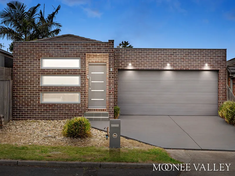 FAMILY COMFORT WITH RARE TRIPLE GARAGE!