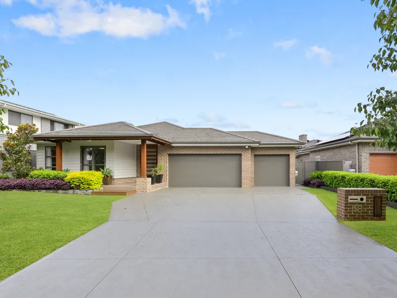 Well Appointed Single Story Residence Facing Natural Woodlands