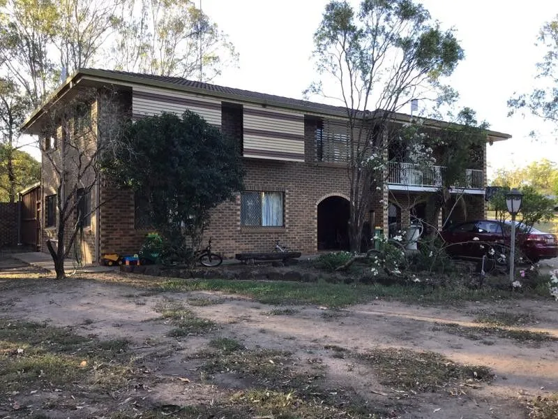 TEN ACRES - SPECIAL AND UNIQUE IN THE HEART OF WITHCOTT - DOUBLE STOREY BRICK VENEER HOME WITH LARGE SHEDS & LARGE DAM