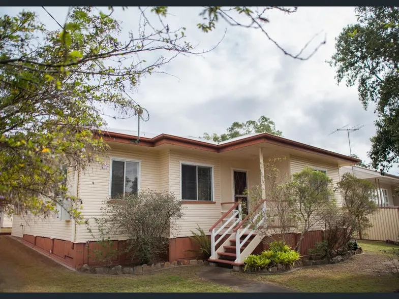 STURDY POST WAR HOME WITH 2 STREET ACCESS