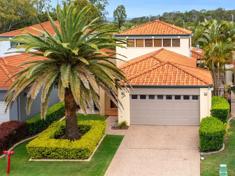 DELUXE FAMILY HOME WITH PRIVATE MARINA BERTH & POOL LOCATED IN THE 'PEARL BAY GATED ESTATE' HOMES LIKE THIS DONT LAST LONG!