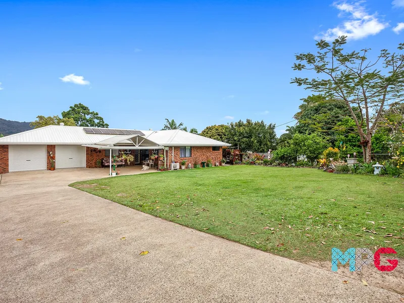 ½ Acre, Dual Living + Sheds!