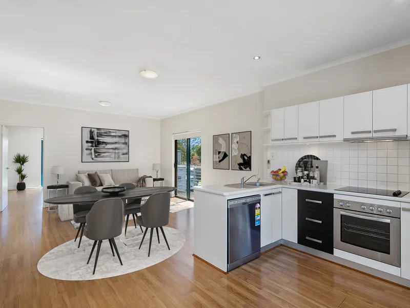 Modern and stylish top-floor unit with a host of updates