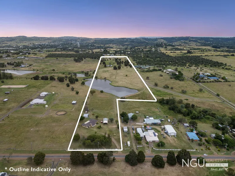 16 ACRES WITH TOWN WATER: EXPERIENCE PEACE AND SERENITY IN THIS RENOVATED COUNTRY HOME