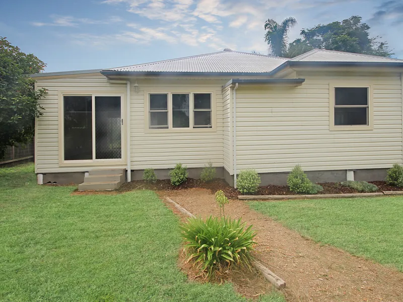 Partially renovated property on a large flat 1619sqm block