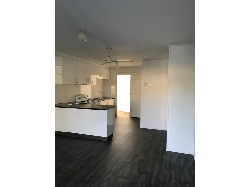 Brick - airconditioning and handy to schools and shopping complex.