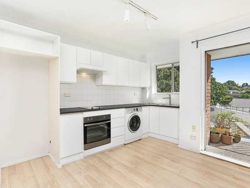 Top floor, light filled apartment with leafy outlook