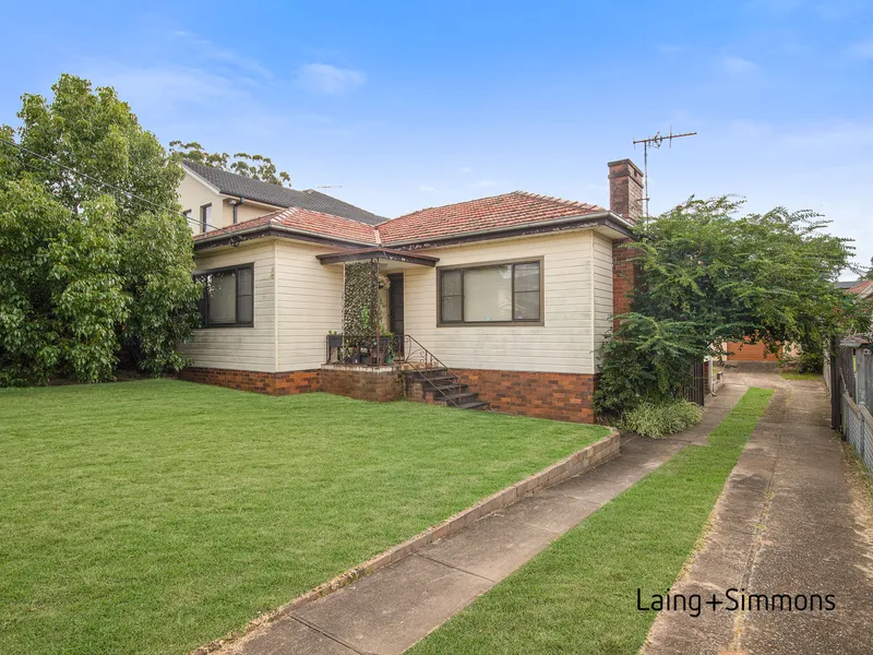 Located on a quiet street is this three-bedroom timber house
