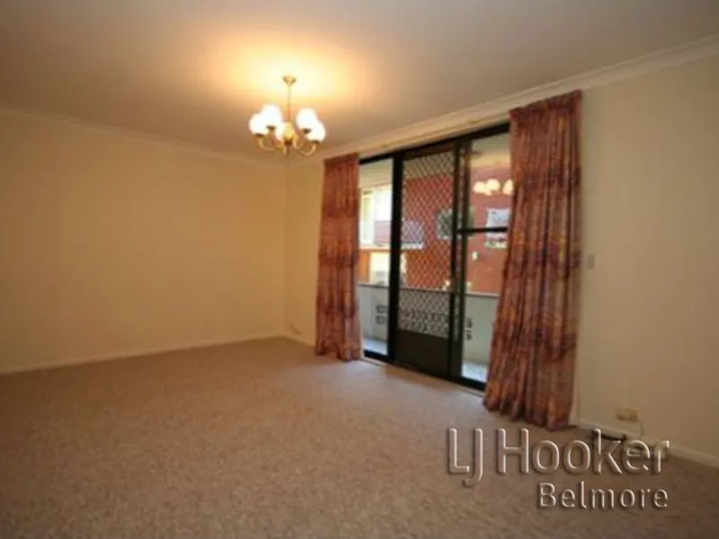 2 large bedrooms with b/ins + Carport