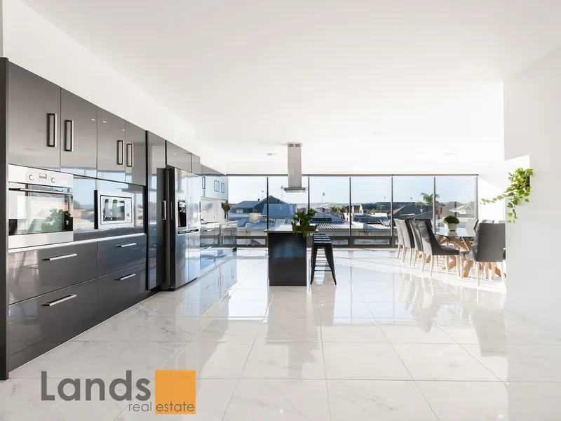 Wonderful Home with Magnificent Entertaining Overlooking A Beautiful Lake.
