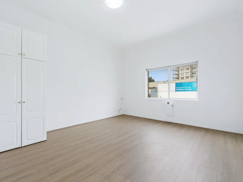 Centrally Located One Bedroom with Modern Kitchen and Built Ins!