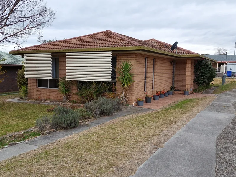 Very Tidy Brick and Tile Home - Great Investment