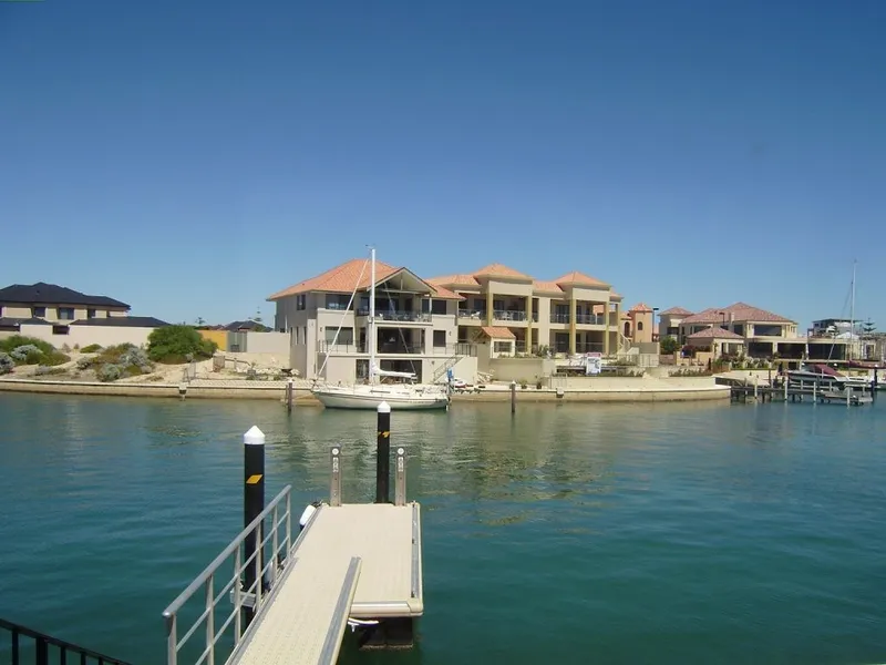 TRIPLE LEVEL PROPERTY WITH CANAL VIEWS & JETTY!