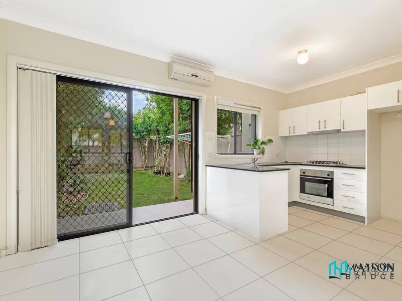Spacious 2 Bedroom Townhouse with Easy to Maintain Backyard, Perfect for Family