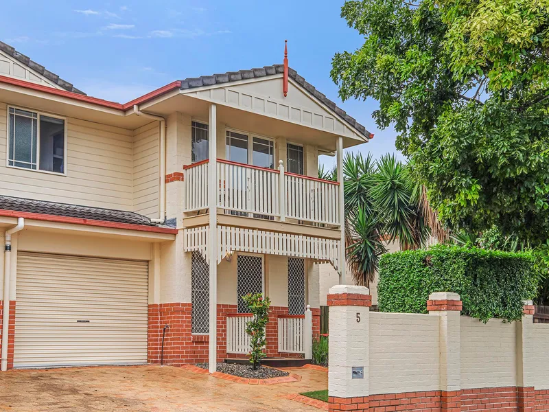 Fantastic three-bedroom townhome with city views and private courtyard