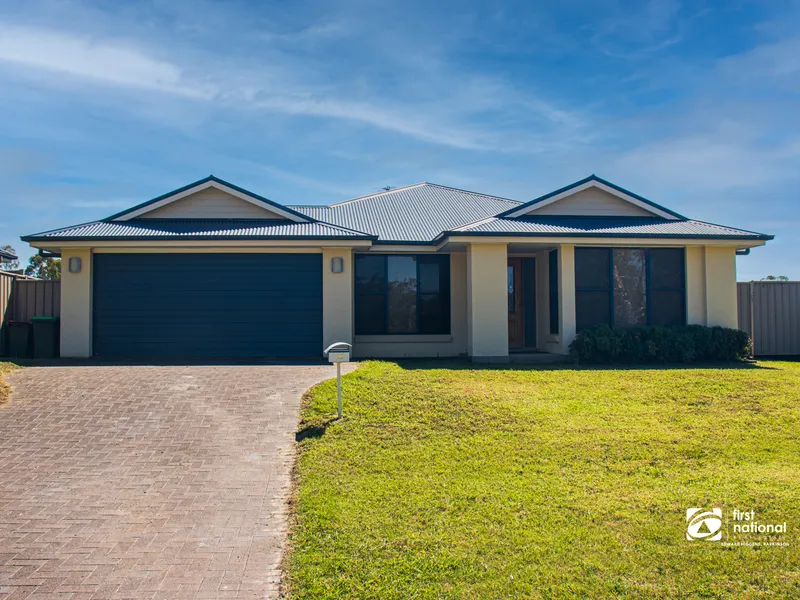 Modern and spacious four-bedroom family home with large undercover outdoor entertainment areas