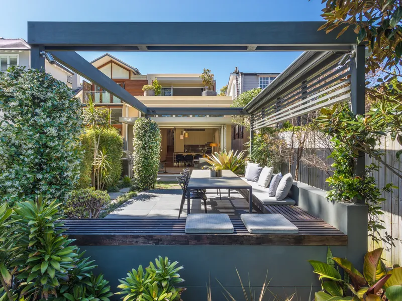 Character home masterfully renovated to provide a luxury living experience with tranquil landscaped gardens
