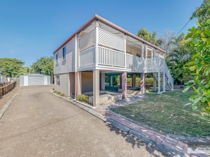 Charming Queenslander with Sunroom, Shed and Spacious Verandah