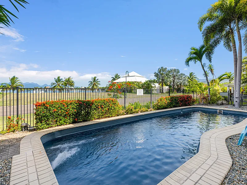 FIRST FLOOR, TWO BEDROOM APARTMENT WITHIN RESORT STYLE COMPLEX WITH OCEAN GLIMPES!