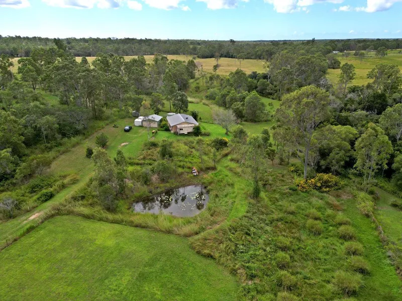 2 BRM HOME ON VERY PRETTY 5 ACRES