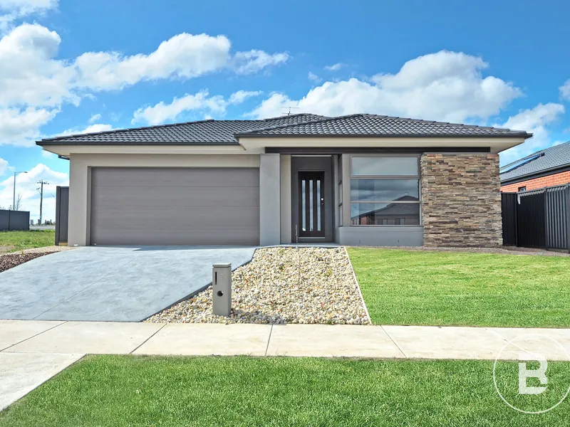 MODERN FOUR BEDROOM HOME IN GROWING AREA