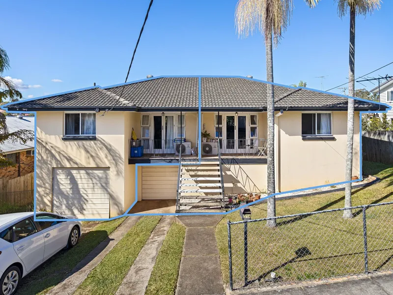 Dual-Unit Home with Development Potential!