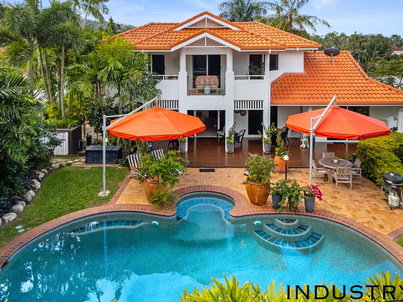 Tropical resort oasis in gated estate