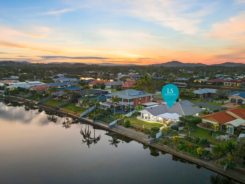 Single Level Waterfront Entertainer in a Coveted Location