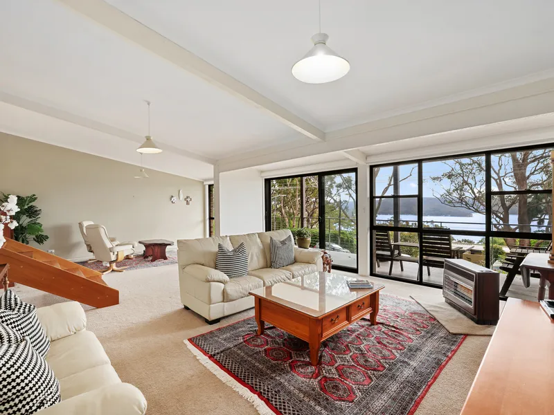 Pittwater Views In Stylish Split Level Home