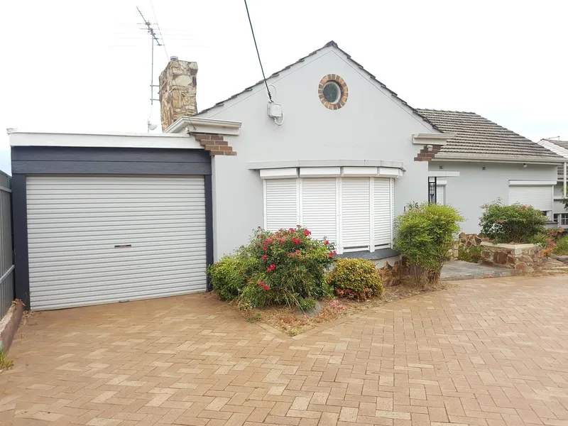 This Solid Brick Colonial Home offers room to move for a large family Close to Flinders University and Medical Centre.
