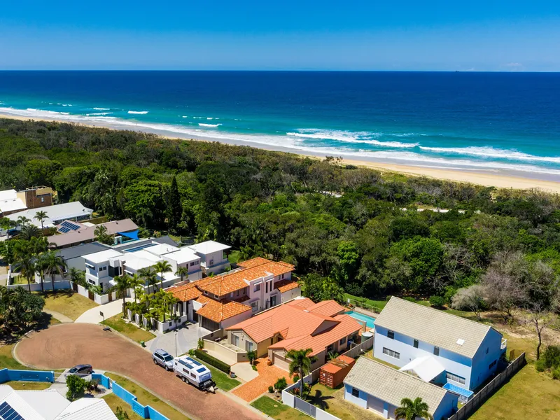 EXCLUSIVE BEACH COURT HOME WITH DIRECT BEACH ACCESS