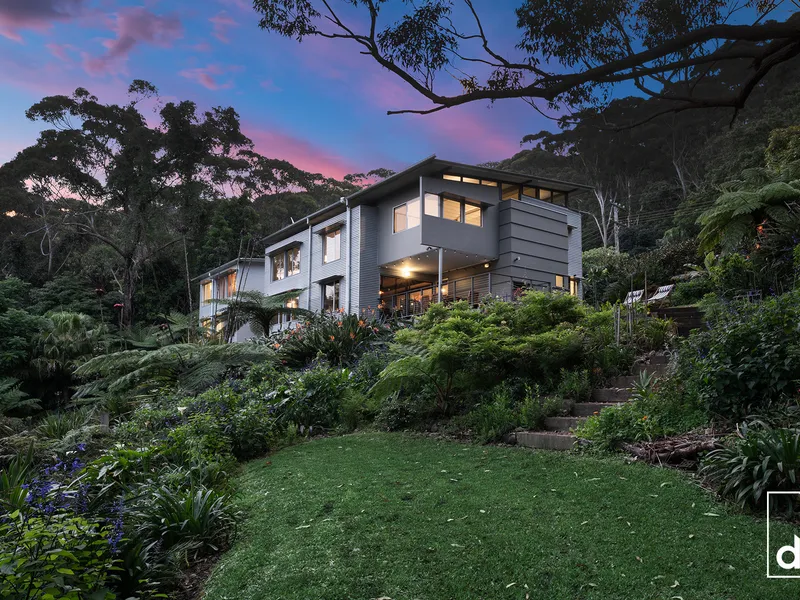 Bespoke architectural brilliance nestled within coastal rainforest for an unparalleled family lifestyle!