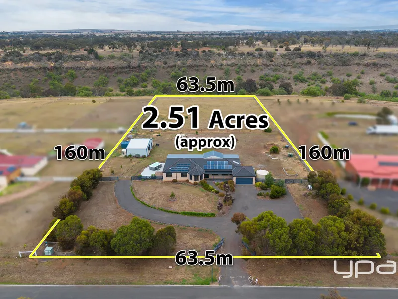 2.5 ACRES BACKING ONTO THE WERRIBEE RIVER