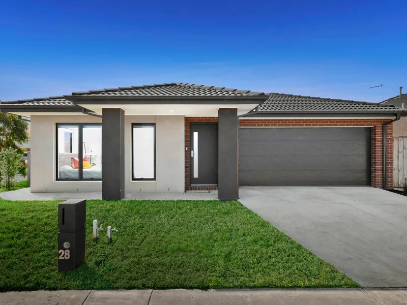Sharp, Stylish & Low Maintenance Home in Convenient Location!
