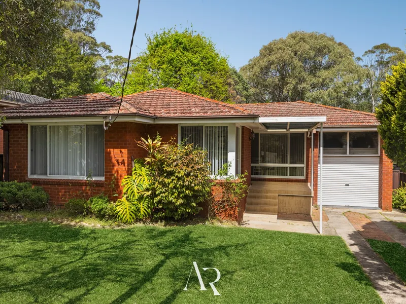 A Spacious Oasis with Three Bedrooms, Generous Yard, and Garage