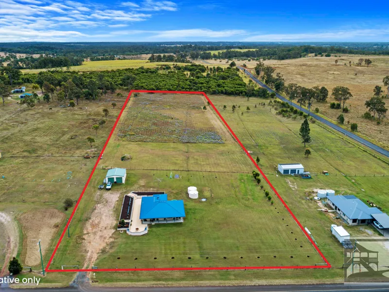 FOUR BEDROOM FAMILY HOME ON SIX AND A HALF ACRES