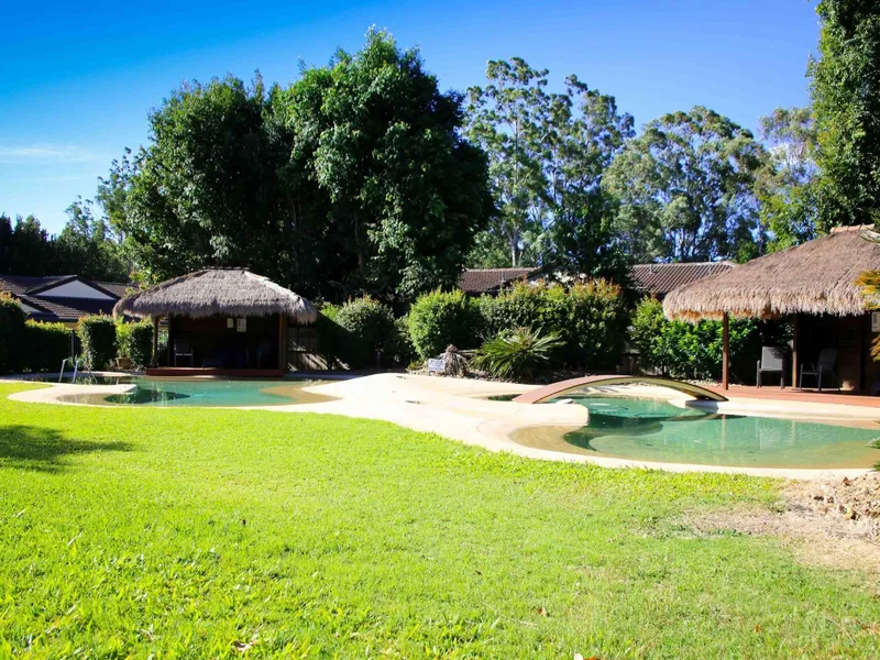 Low Maintenance Resort Style Living within walk to Bay