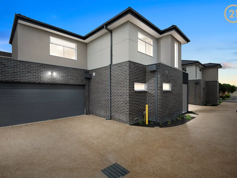 A MODERN BEAUTY IN A SUPERB LOCATION!