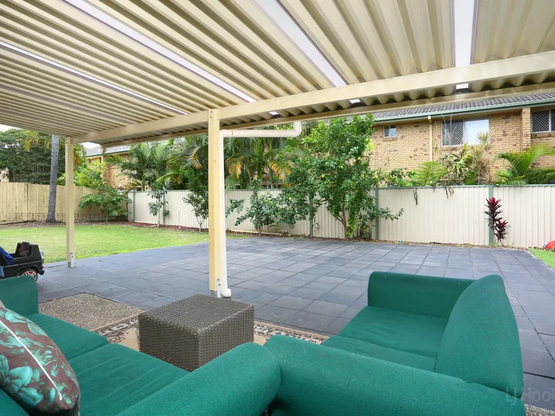 PRICE SLASHED! Single level villa with an extra spacious backyard